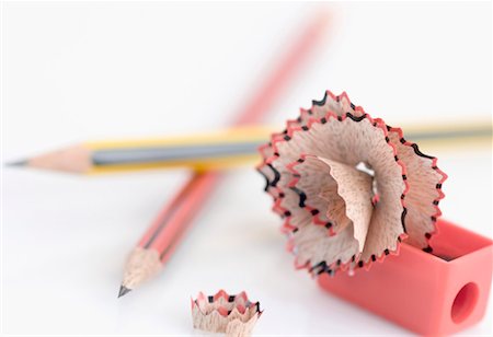 pencil sharpener - Close-up of two pencils and a pencil sharpener Stock Photo - Premium Royalty-Free, Code: 630-01127136