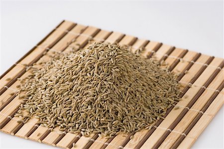 Close-up of Cumin seeds on a place mat Foto de stock - Sin royalties Premium, Código: 630-01127286