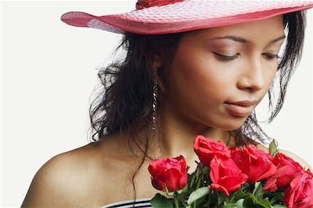 simsearch:655-02883054,k - Close-up of a young woman with a bunch of roses Foto de stock - Royalty Free Premium, Número: 630-01127935