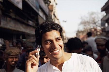 simsearch:630-01128006,k - Close-up of a young man talking on a mobile phone Stock Photo - Premium Royalty-Free, Code: 630-01128066
