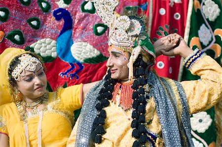 simsearch:630-01191624,k - Close-up of two performers dancing, Elephant Festival, Jaipur, Rajasthan, India Foto de stock - Sin royalties Premium, Código: 630-01128123