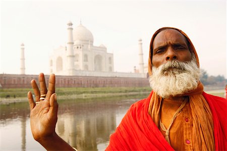 Portrait of a priest standing on the riverbank, Taj Mahal, Agra, Uttar Pradesh, India Stock Photo - Premium Royalty-Free, Code: 630-01128460