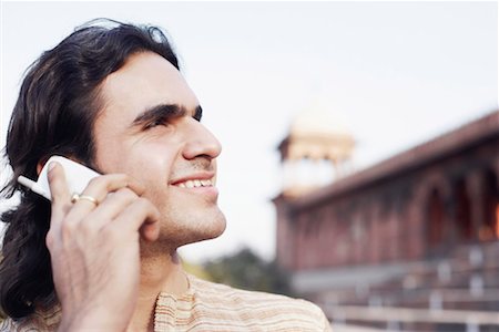 simsearch:630-01128257,k - Close-up of a young man talking on a mobile phone Stock Photo - Premium Royalty-Free, Code: 630-01128508
