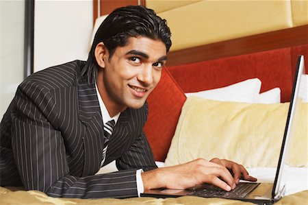 simsearch:630-01126991,k - Close-up of a businessman using a laptop Stock Photo - Premium Royalty-Free, Code: 630-01128614