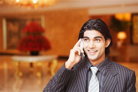 simsearch:630-01078367,k - Close-up of a businessman talking on a mobile phone Foto de stock - Sin royalties Premium, Código: 630-01128700