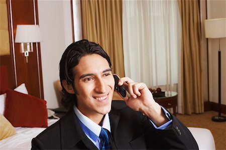 simsearch:630-02219583,k - Businessman talking on a mobile phone Stock Photo - Premium Royalty-Free, Code: 630-01128806