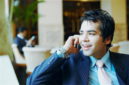 simsearch:630-01126991,k - Close-up of a businessman talking on a mobile phone Stock Photo - Premium Royalty-Free, Code: 630-01128816