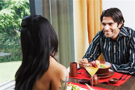 simsearch:630-01130529,k - Young couple dining in a restaurant Stock Photo - Premium Royalty-Free, Code: 630-01128817