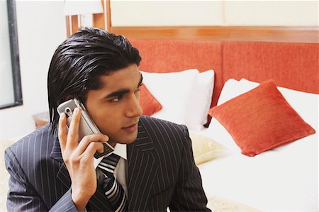 simsearch:630-02219583,k - Close-up of a businessman talking on a mobile phone Stock Photo - Premium Royalty-Free, Code: 630-01128811