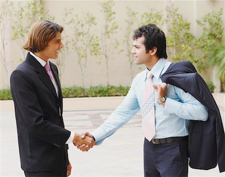 simsearch:630-01126991,k - Two businessmen shaking hands Stock Photo - Premium Royalty-Free, Code: 630-01128858