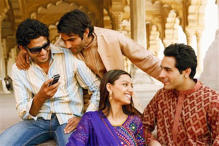 simsearch:630-01128006,k - Young woman and three young men talking to each other, Agra, Uttar Pradesh, India Stock Photo - Premium Royalty-Free, Code: 630-01128966