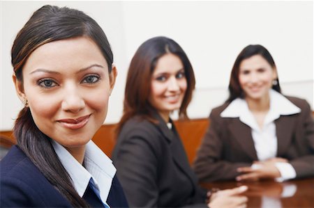 simsearch:630-01126991,k - Portrait of three businesswomen sitting in a conference room Stock Photo - Premium Royalty-Free, Code: 630-01128978