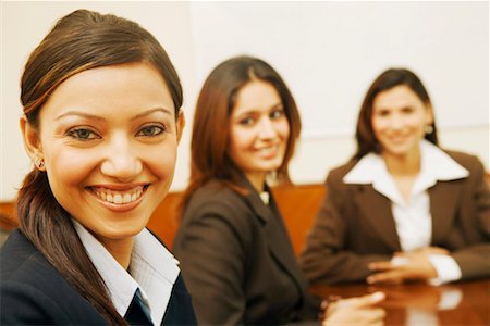 simsearch:630-01126991,k - Portrait of three businesswomen sitting in a conference room Stock Photo - Premium Royalty-Free, Code: 630-01128979