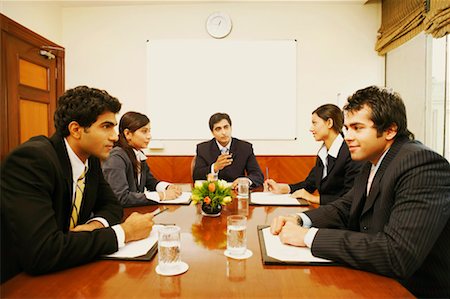 simsearch:630-01128982,k - Five business executives at a meeting in a conference room Stock Photo - Premium Royalty-Free, Code: 630-01128971