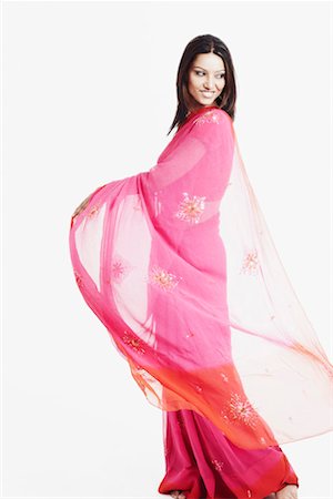 saree style - Side profile of a young woman looking down Stock Photo - Premium Royalty-Free, Code: 630-01130105