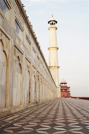 Low angle view of an ornate wall leading to a minaret, Taj Mahal, Agra, Uttar Pradesh, India Stock Photo - Premium Royalty-Free, Code: 630-01130386