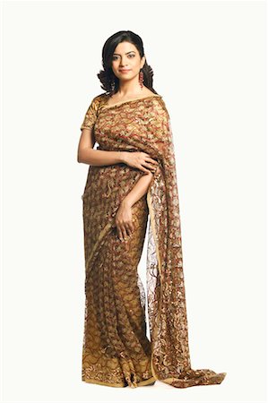 saree style - Portrait of a young woman wearing a sari Stock Photo - Premium Royalty-Free, Code: 630-01130403