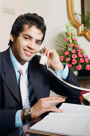 simsearch:630-01128784,k - Portrait of a businessman talking on the telephone Stock Photo - Premium Royalty-Free, Code: 630-01131110