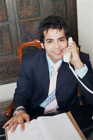 simsearch:630-01128454,k - Portrait of a businessman talking on the telephone Stock Photo - Premium Royalty-Free, Code: 630-01131165