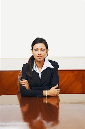 simsearch:630-01130741,k - Portrait of a businesswoman sitting in a conference room Stock Photo - Premium Royalty-Free, Code: 630-01131169