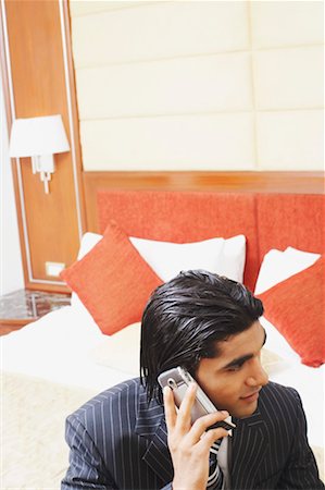 simsearch:630-02219583,k - Businessman talking on a mobile phone Stock Photo - Premium Royalty-Free, Code: 630-01131170