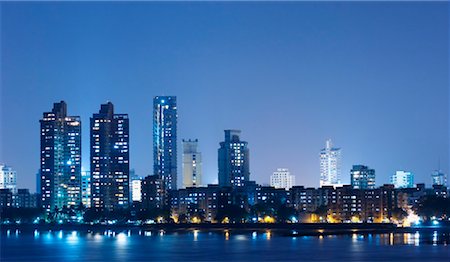 Buildings lit up at dusk, Mumbai, Maharashtra, India Foto de stock - Sin royalties Premium, Código: 630-01191617