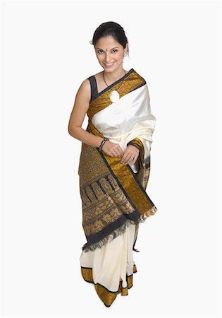 Portrait of a young woman wearing sari Stock Photo - Premium Royalty-Free, Code: 630-01191757