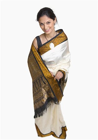 Portrait of a young woman wearing sari Stock Photo - Premium Royalty-Free, Code: 630-01191758
