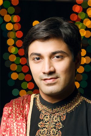 simsearch:630-01192929,k - Porträt eines jungen Mannes tragen traditionellen indischen Kleidung Stockbilder - Premium RF Lizenzfrei, Bildnummer: 630-01192386