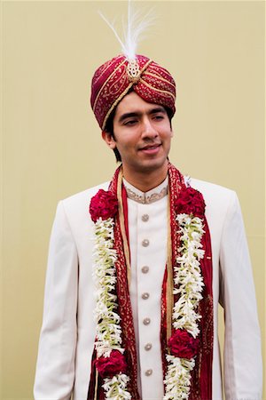 Close-up of a groom in a traditional wedding dress Stock Photo - Premium Royalty-Free, Code: 630-01192928