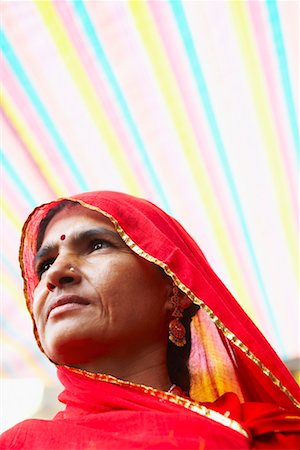 Close-up of a mature woman in a traditional clothing Stock Photo - Premium Royalty-Free, Code: 630-01490683