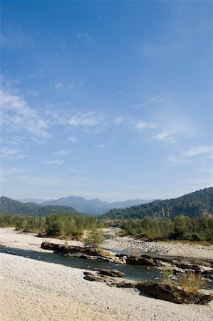 River flowing in front of mountains, Jim Corbett National Park, Pauri Garhwal, Uttarakhand, India Stock Photo - Premium Royalty-Free, Code: 630-01491159