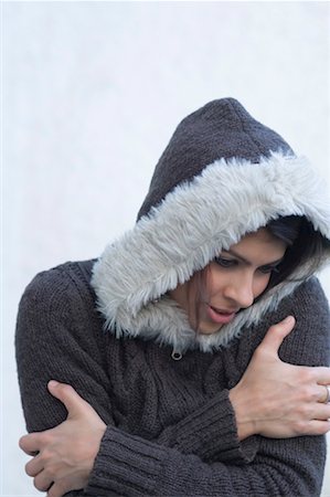 Man In Winter Clothes Shivering From The Cold Stock Photo, Picture