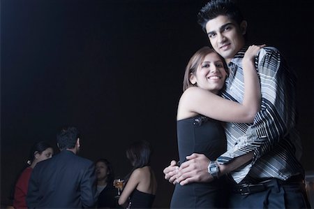 Portrait of a young couple dancing Foto de stock - Sin royalties Premium, Código: 630-01491691