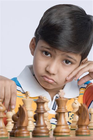 simsearch:630-01491714,k - Portrait of a boy playing chess Stock Photo - Premium Royalty-Free, Code: 630-01491730