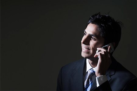 simsearch:630-01873878,k - Close-up of a businessman talking on a mobile phone Stock Photo - Premium Royalty-Free, Code: 630-01492060