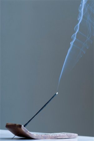 Close-up of a burning incense stick Stock Photo - Premium Royalty-Free, Code: 630-01492280