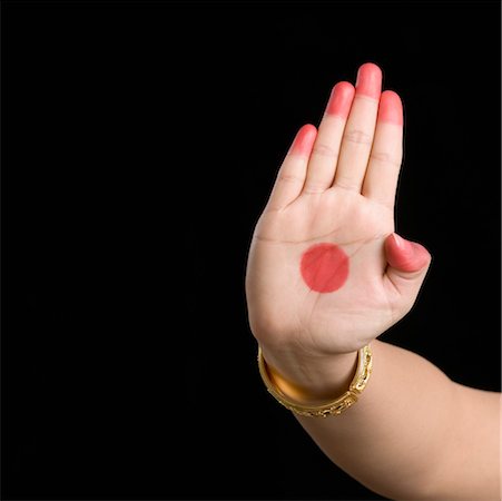 Close-up of a woman's hand making a Bharatnatyam gesture Foto de stock - Sin royalties Premium, Código: 630-01492338