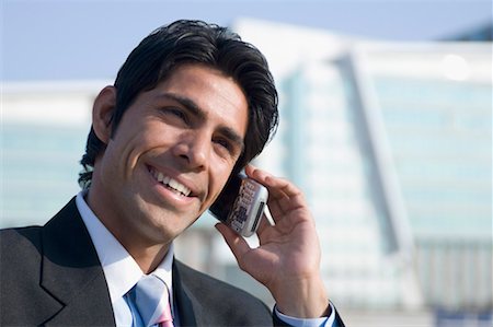 simsearch:630-01873878,k - Close-up of a businessman talking on a mobile phone Stock Photo - Premium Royalty-Free, Code: 630-01492533