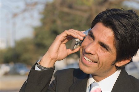 simsearch:630-01873878,k - Close-up of a businessman talking on a mobile phone Stock Photo - Premium Royalty-Free, Code: 630-01492552