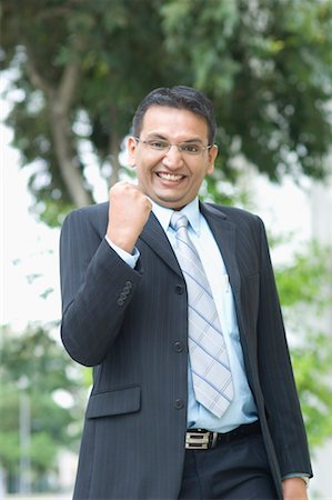 fiore - Close-up of a businessman making a fist Stock Photo - Premium Royalty-Free, Code: 630-01492677