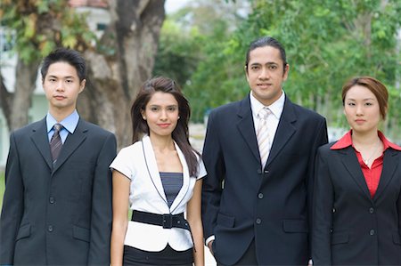 Portrait of two businessmen standing with two businesswomen Stock Photo - Premium Royalty-Free, Code: 630-01492730