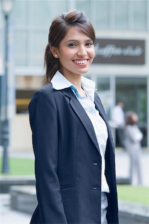 fiore - Portrait of a businesswoman smiling Stock Photo - Premium Royalty-Free, Code: 630-01492764