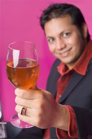 simsearch:630-01492979,k - Portrait of a businessman holding a glass of wine Foto de stock - Sin royalties Premium, Código: 630-01492910
