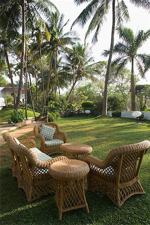 rattan not people - Armchairs and a couch in a lawn Stock Photo - Premium Royalty-Free, Code: 630-01708649