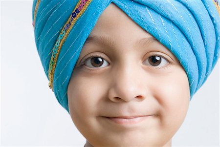 sikhism traditional clothing - Portrait of a boy smirking Stock Photo - Premium Royalty-Free, Code: 630-01708783