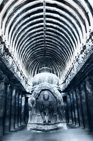 Statue of Buddha in a cave, Buddhist Chaitya Hall, Ellora, Aurangabad, Maharashtra, India Foto de stock - Sin royalties Premium, Código: 630-01709003