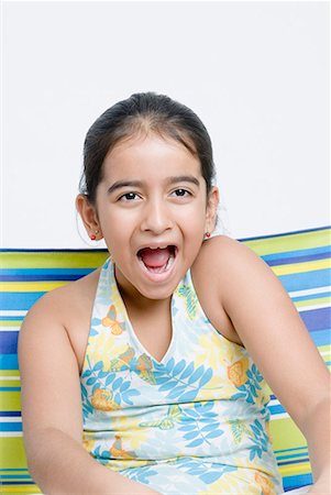 facial expressions kids yelling - Close-up of a girl with mouth open Stock Photo - Premium Royalty-Free, Code: 630-01709107