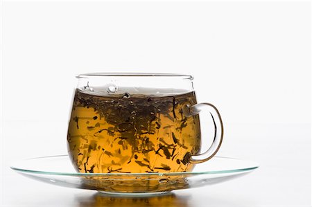 floating object on water - Tea leaves floating in a cup of herbal tea Stock Photo - Premium Royalty-Free, Code: 630-01709208