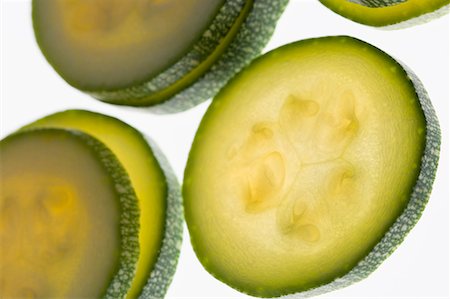 sliced cucumber - Close-up of cucumber slices Stock Photo - Premium Royalty-Free, Code: 630-01709339